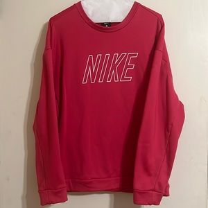 Pink Nike sweatshirt